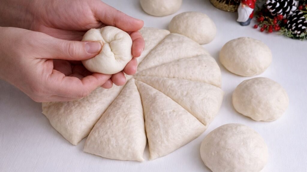 Shaping dough balls for homemade baguettes