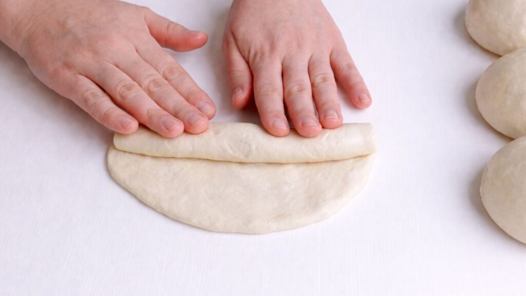 Shaping mini baguettes from dough balls