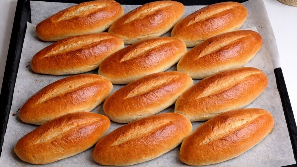 Baked mini baguettes with golden brown crust