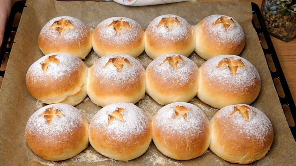 Freshly baked milk buns in the baking tray with a golden brown crust from this Easy Milk Buns Recipe.