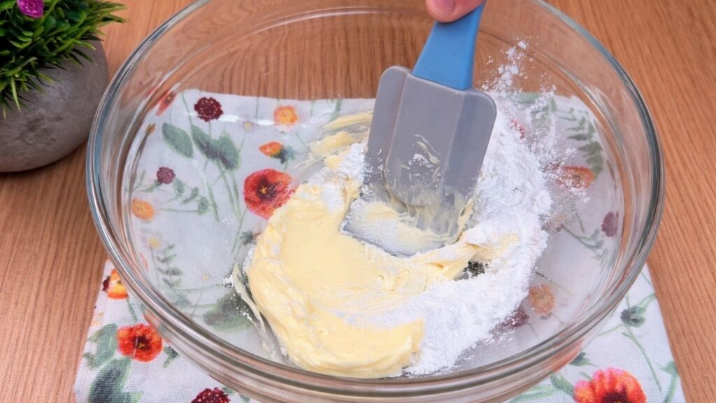 butter and vanilla in a bowl ready to be mixed for cream cheese glaze