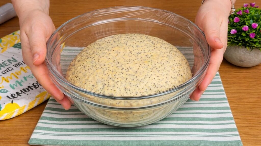 dough rising in bowl lemon poppy seed rolls