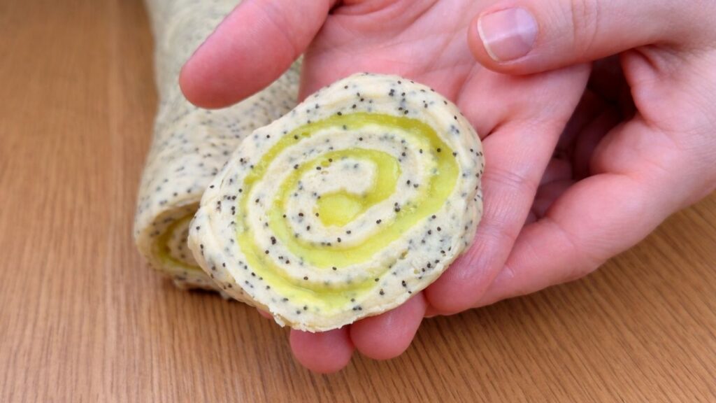 lemon poppy seed roll in hand