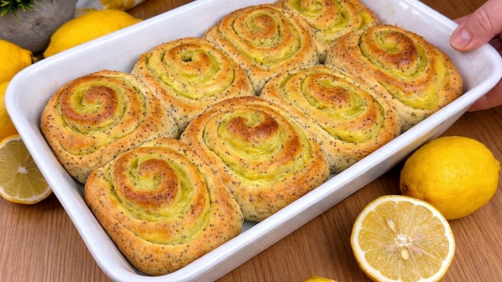 baked lemon poppy seed rolls in baking dish