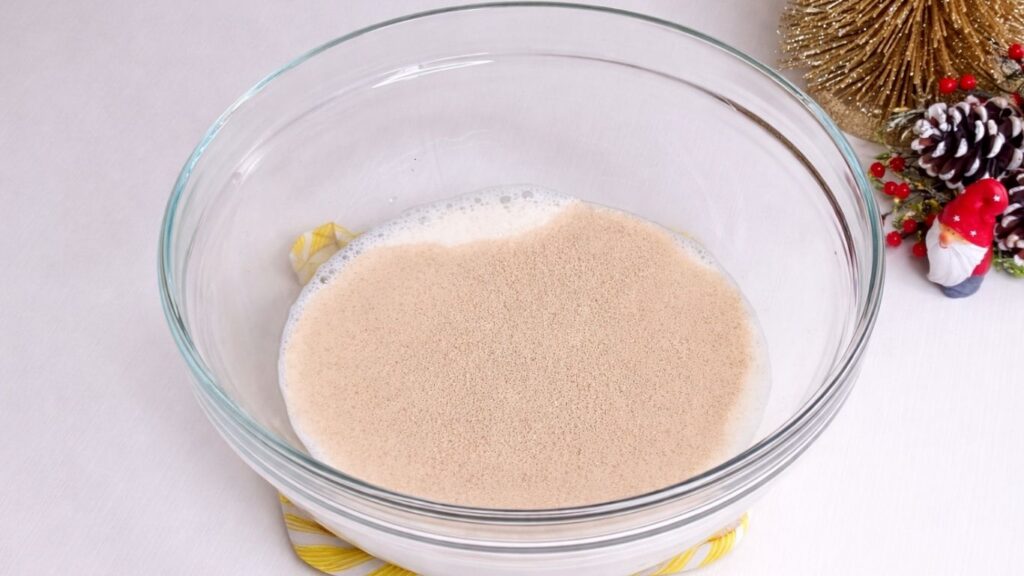 yeast mixed in warm milk for homemade milk bread