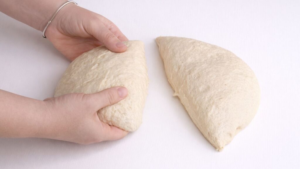 dividing milk bread dough into two equal pieces