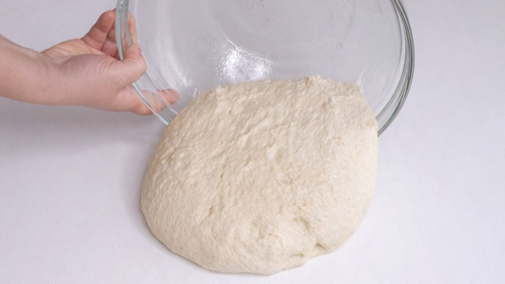 milk bread dough placed on a clean work surface