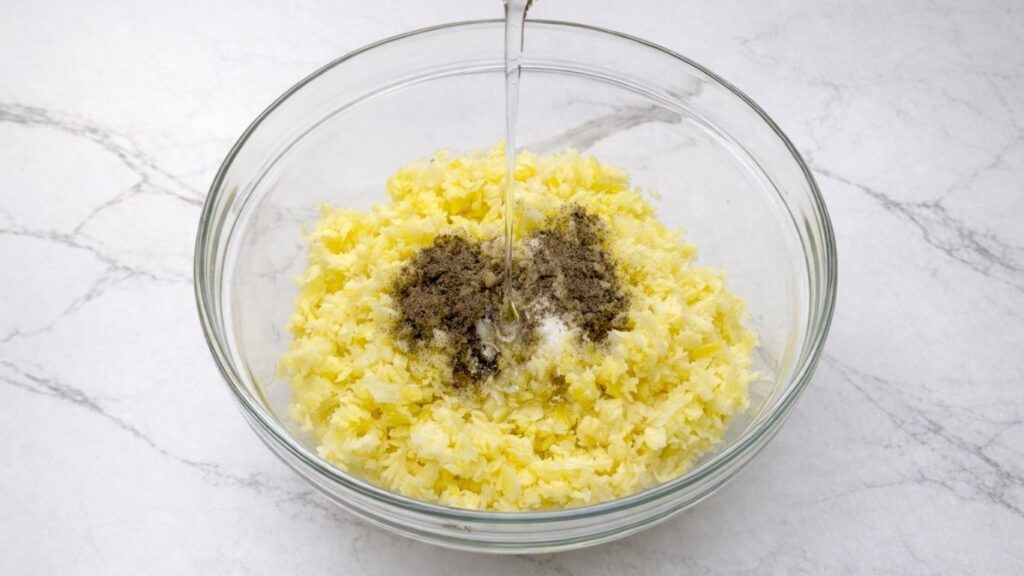 chopped potatoes and onion mixed with oil, salt, and black pepper for potato borek filling