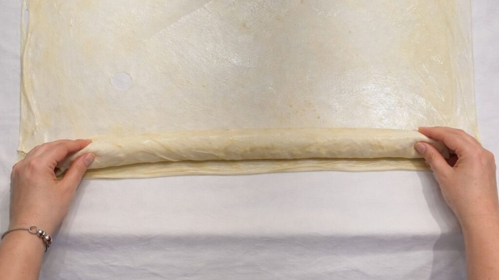 rolled potato borek dough filled with potato and onion mixture ready for shaping