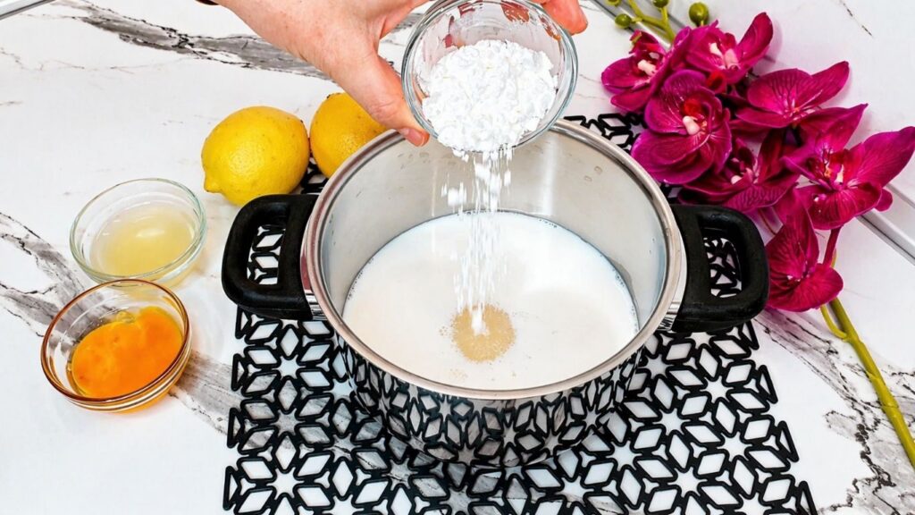 Adding cornstarch to milk for the cream filling of no-bake lemon cake