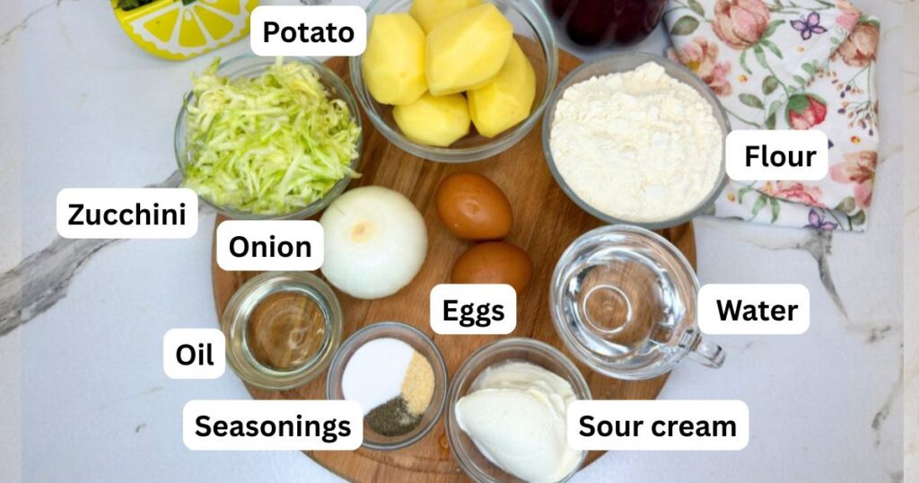 Ingredients for zucchini and potato slice arranged on a table