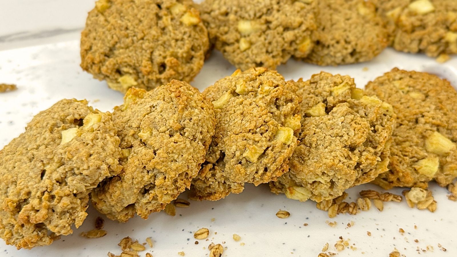 Gluten-free apple oatmeal cookies with cinnamon, rolled oats, and fresh apple pieces