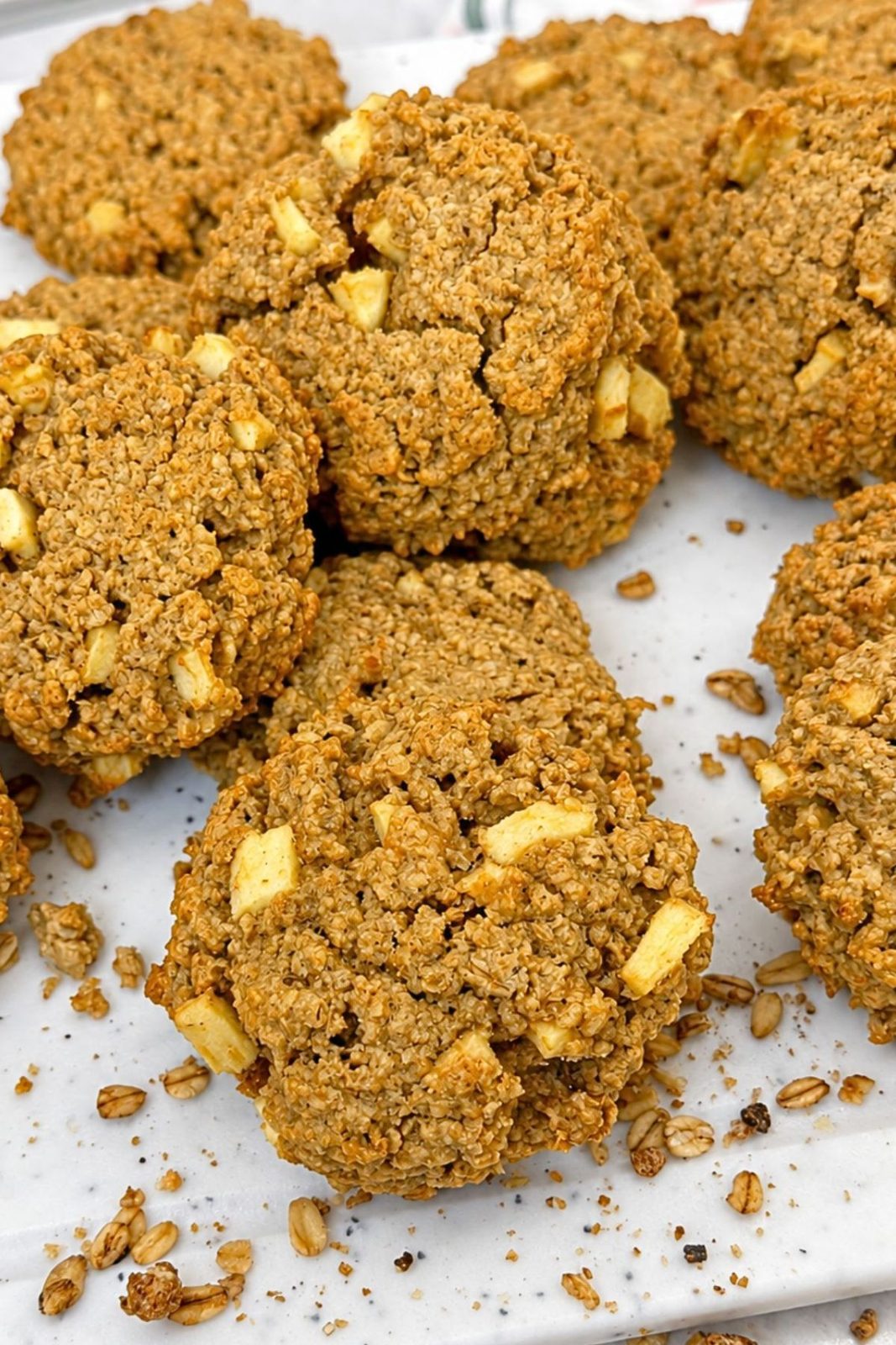 Freshly baked gluten-free apple oatmeal cookies arranged on a serving tray