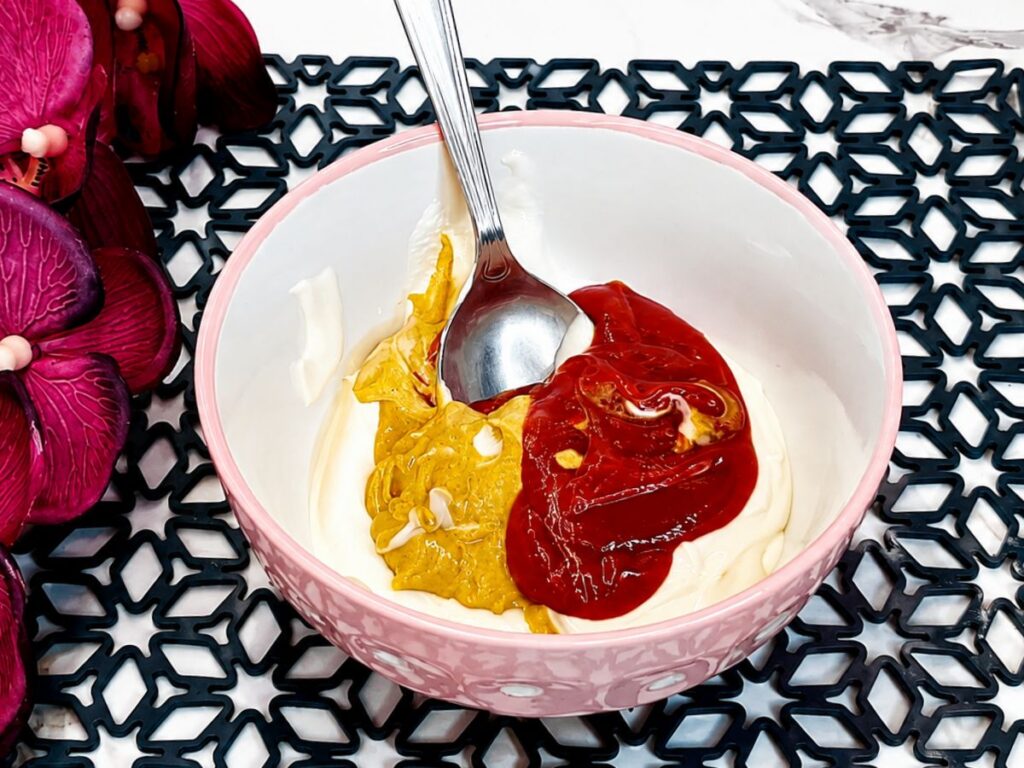 Mayonnaise, mustard, ketchup, and sour cream prepared for creamy burger sauce