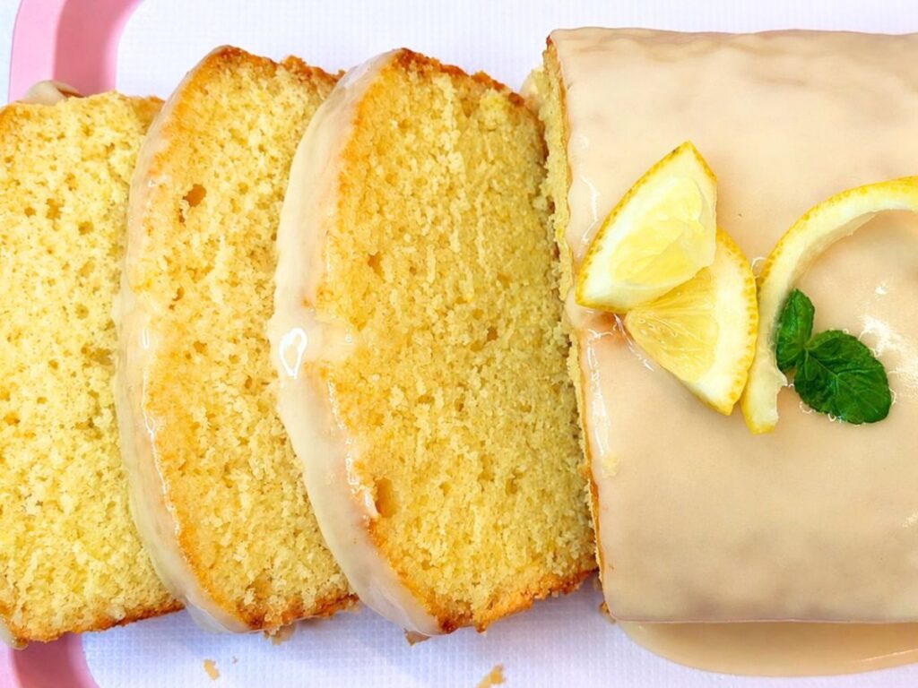 Moist lemon pound cake with lemon glaze and fresh lemon slices