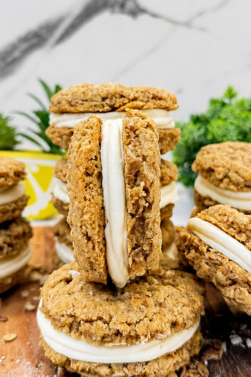 Close-up of homemade oatmeal cream pies filled with thick vanilla buttercream