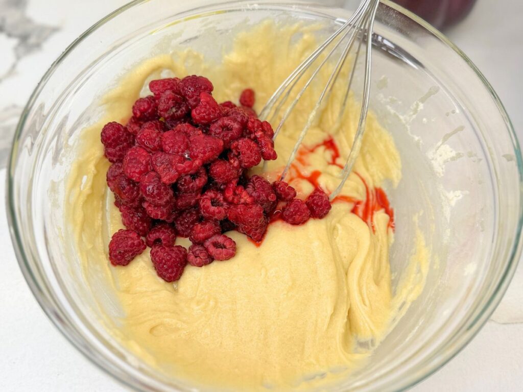 Fresh raspberries gently folded into the homemade quick bread batter.