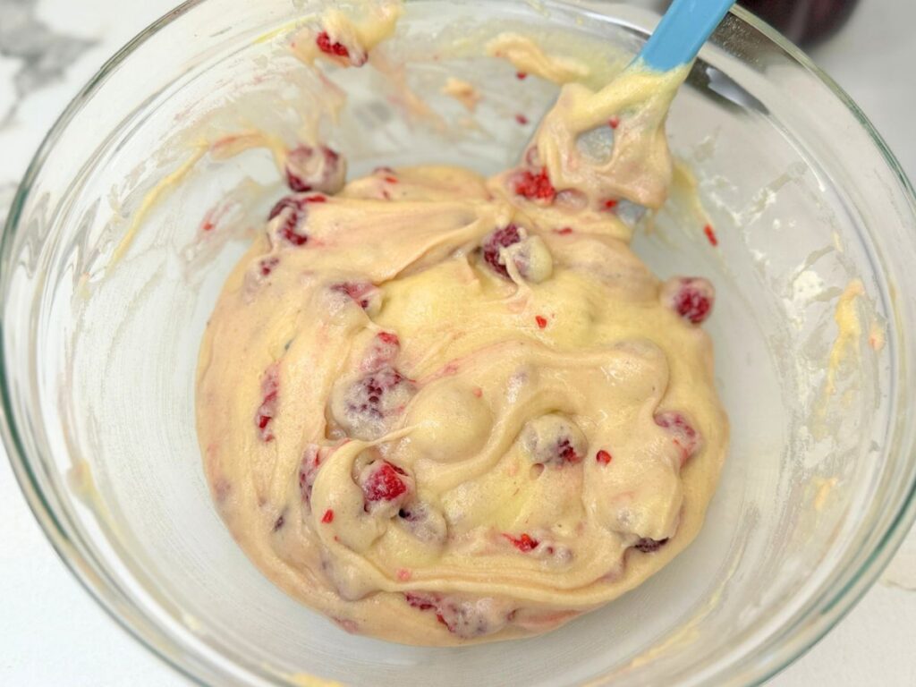 Fresh raspberries gently folded into the homemade quick bread batter.