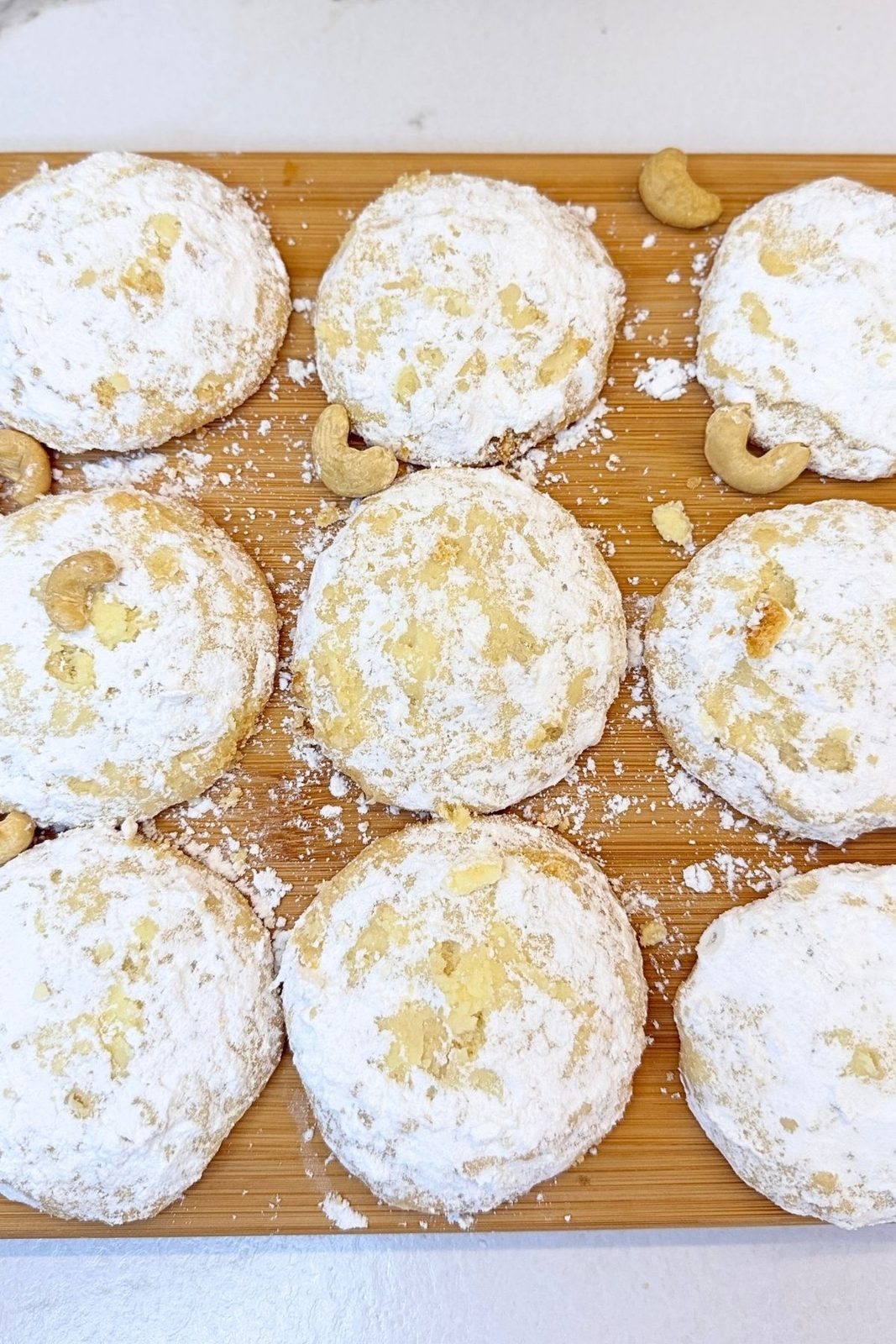 Finished Cashew Meltaway Cookies coated twice in powdered sugar