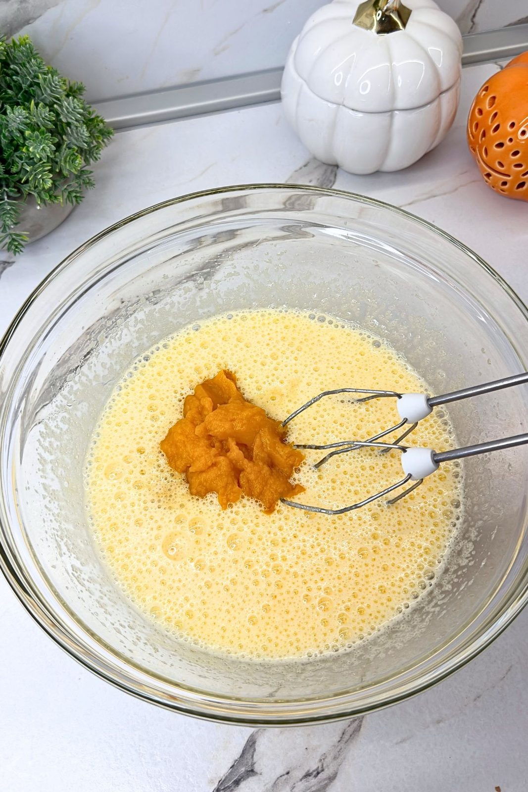 Pumpkin purée and vanilla added to the beaten egg mixture.